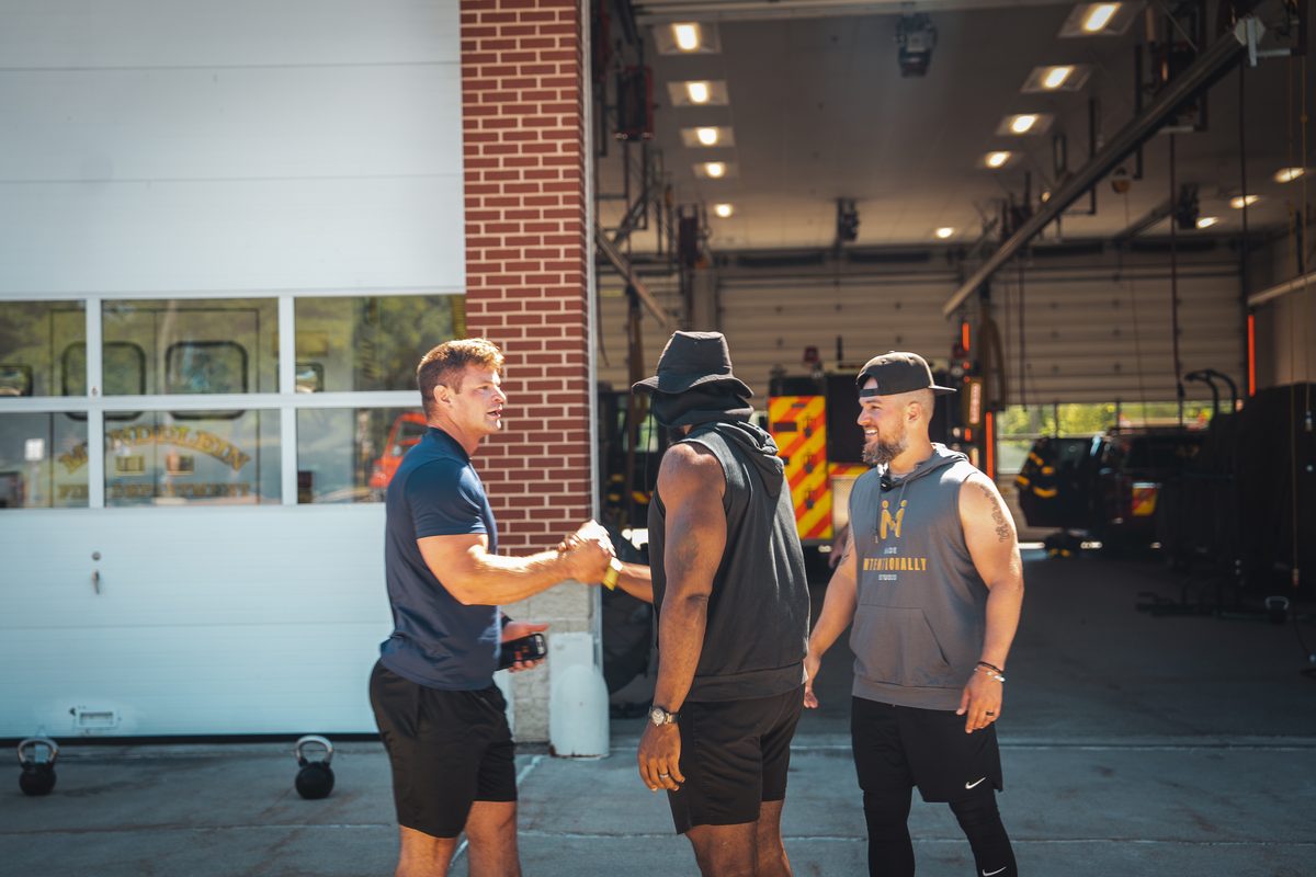holiAthlete coaching a session with the Mundelein Fire Department