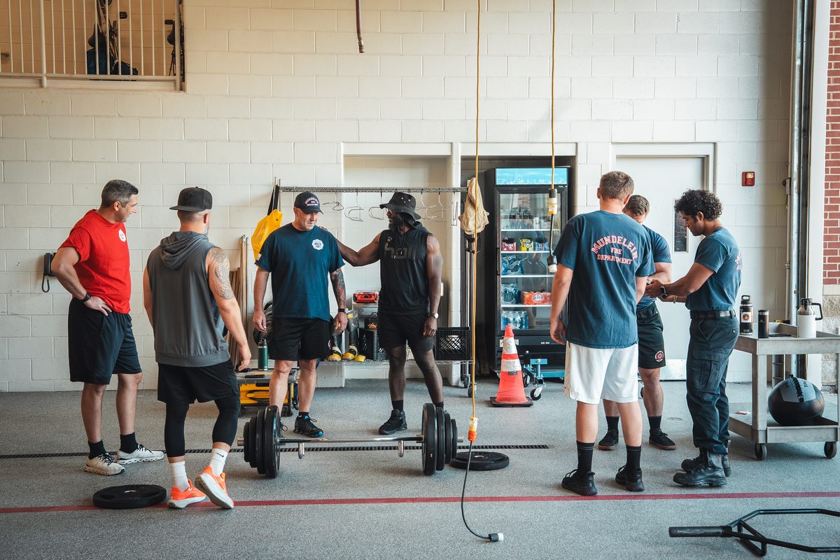 holiAthlete coaching a session with the Mundelein Fire Department