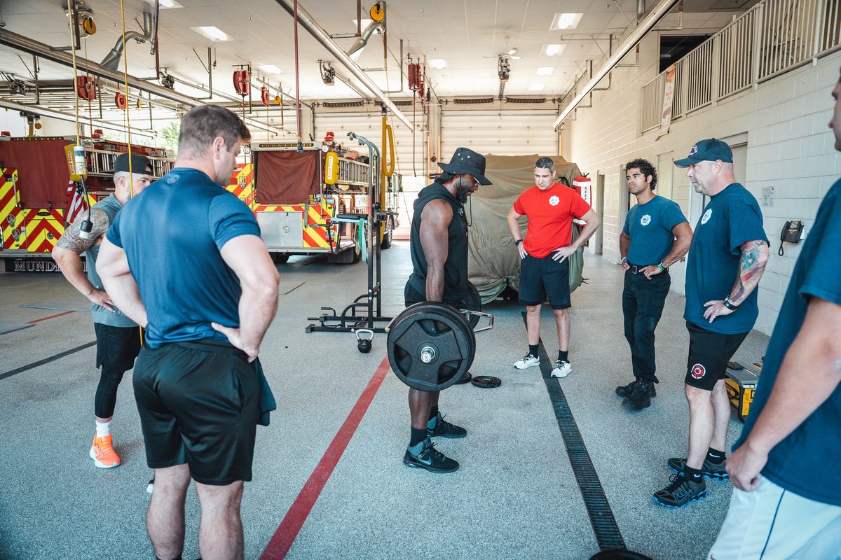 holiAthlete coaching a session with the Mundelein Fire Department